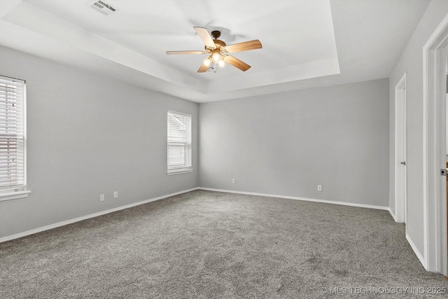 40 E Fairlane Pl, Sapulpa, OK 74066 - empty room with a ceiling fan, carpet, and a tray ceiling
