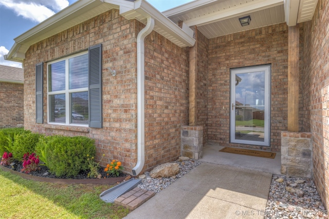 7420 E 160th Pl S, Bixby, OK 74008 - doorway to property with brick siding