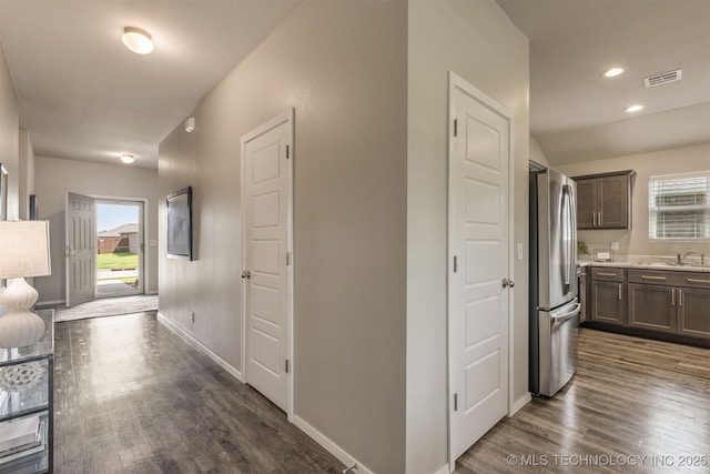 7420 E 160th Pl S, Bixby, OK 74008 - hall with dark wood finished floors and recessed lighting