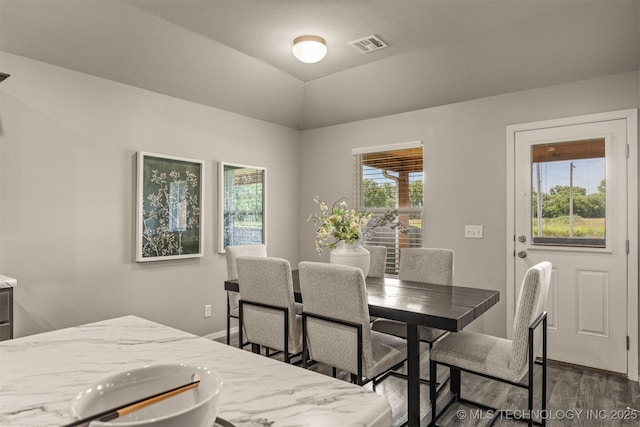7420 E 160th Pl S, Bixby, OK 74008 - dining space featuring dark wood-style floors and baseboards