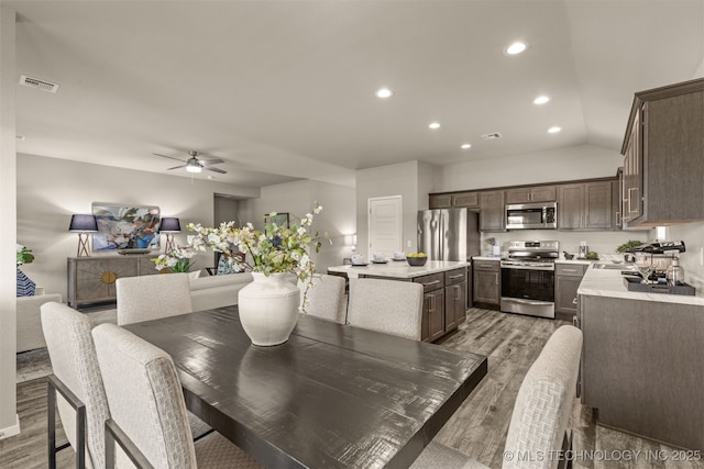 7420 E 160th Pl S, Bixby, OK 74008 - dining area with light wood-style floors, ceiling fan, and recessed lighting