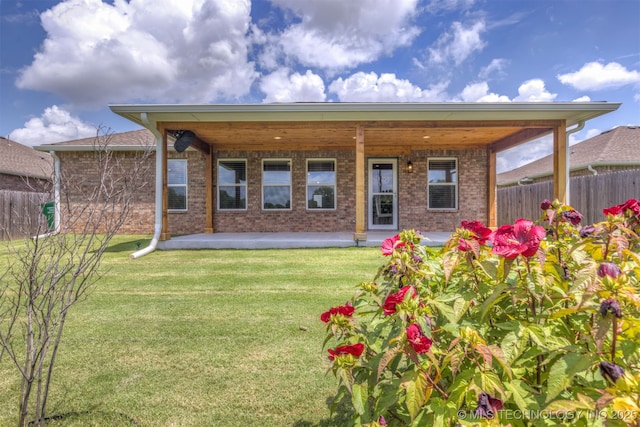 7420 E 160th Pl S, Bixby, OK 74008 - rear view of house featuring brick siding and a patio