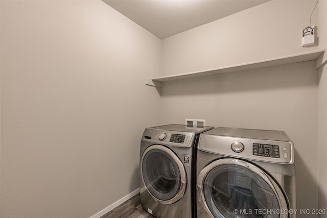 7420 E 160th Pl S, Bixby, OK 74008 - washroom with washing machine and dryer and wood finished floors