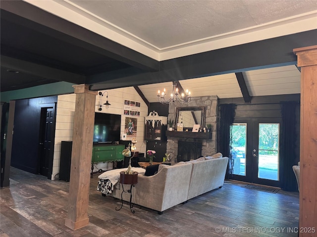 9858 N 38th Ave W, Sperry, OK 74073 - living area with wood finished floors, a chandelier, a fireplace, and wooden walls