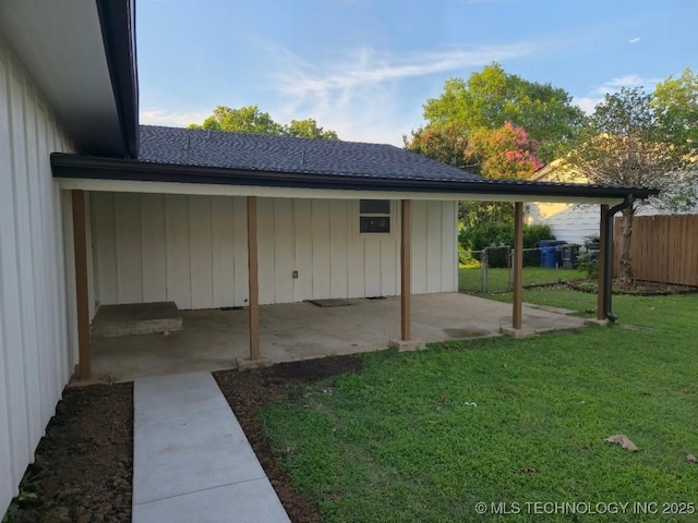 6706 E 28th Pl, Tulsa, OK 74129 - view of property exterior featuring a patio and a shingled roof