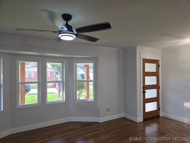 6706 E 28th Pl, Tulsa, OK 74129 - spare room featuring dark wood-style floors, ceiling fan, and ornamental molding
