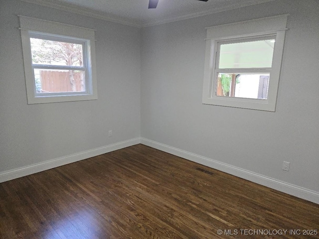 6706 E 28th Pl, Tulsa, OK 74129 - unfurnished room featuring ornamental molding, dark wood-style flooring, and ceiling fan