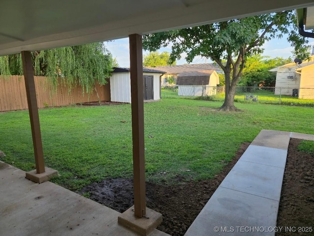 6706 E 28th Pl, Tulsa, OK 74129 - fenced backyard with a shed