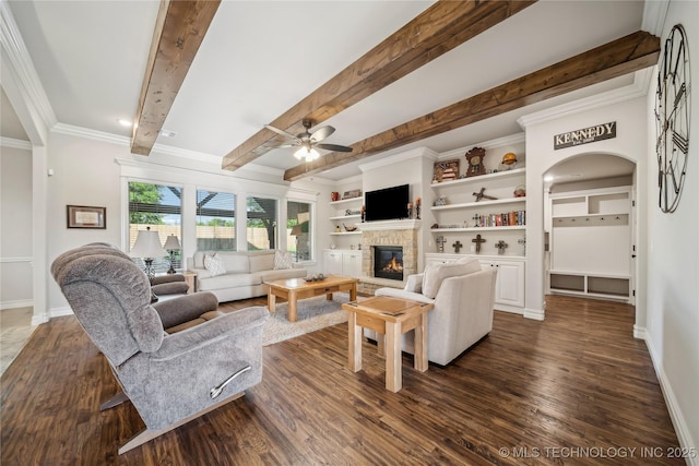 20905 S Windsor Ave, Claremore, OK 74019 - living room featuring a fireplace, dark wood-style flooring, beamed ceiling, ornamental molding, and a ceiling fan
