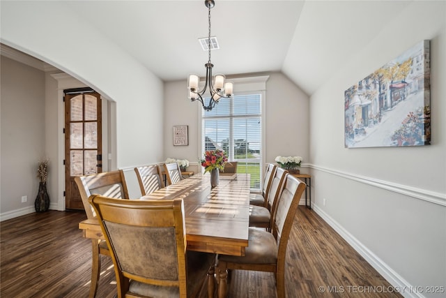 20905 S Windsor Ave, Claremore, OK 74019 - dining area with dark wood-style flooring, a chandelier, arched walkways, and vaulted ceiling