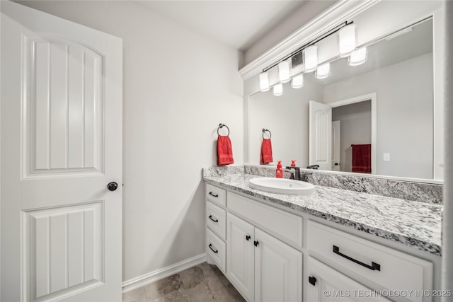 20905 S Windsor Ave, Claremore, OK 74019 - bathroom with vanity and marble look tiles