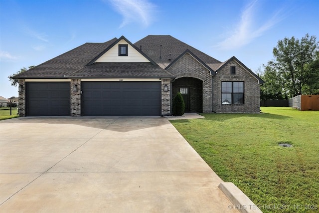 14109 N 72nd E Ave, Collinsville, OK 74021 - view of front of property featuring brick siding, an attached garage, concrete driveway, and roof with shingles