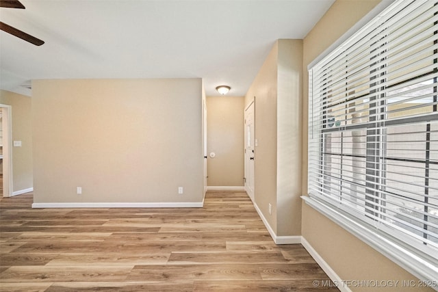 2003 Charlestown Cir, Claremore, OK 74017 - empty room featuring light wood finished floors and a ceiling fan