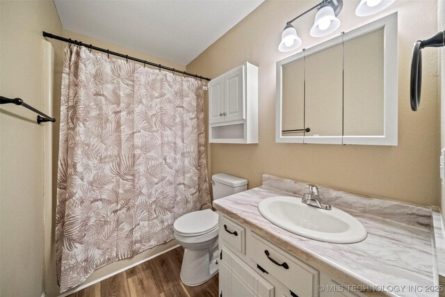 2003 Charlestown Cir, Claremore, OK 74017 - bathroom with vanity and wood finished floors