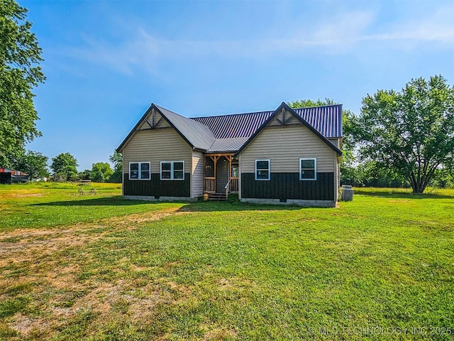 5068 E 188th St S, Warner, OK 74469 - view of front facade featuring a front lawn and a metal roof