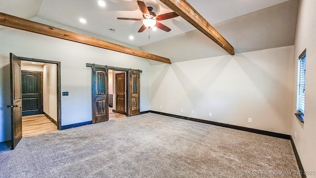 5068 E 188th St S, Warner, OK 74469 - unfurnished bedroom with carpet flooring, a barn door, recessed lighting, and a ceiling fan