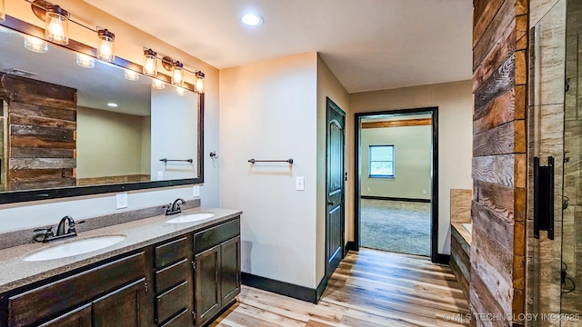 5068 E 188th St S, Warner, OK 74469 - full bath with wood finished floors, double vanity, and recessed lighting