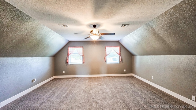 5068 E 188th St S, Warner, OK 74469 - additional living space with a textured wall, a textured ceiling, a ceiling fan, carpet floors, and lofted ceiling