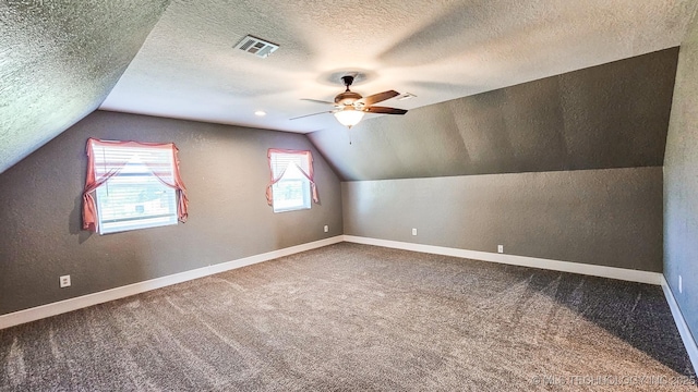 5068 E 188th St S, Warner, OK 74469 - additional living space with ceiling fan, a textured ceiling, lofted ceiling, carpet, and a textured wall