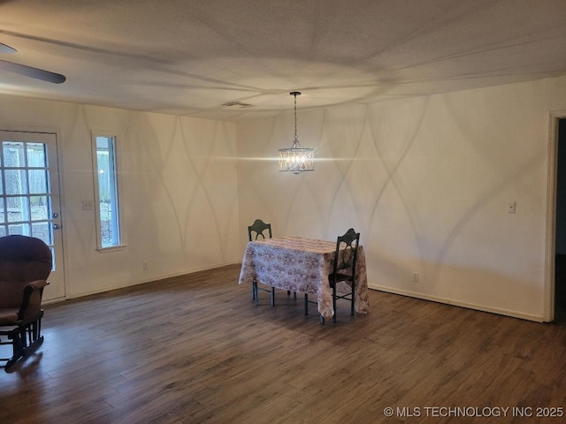1604 S 5th St, Mcalester, OK 74501 - dining area featuring dark wood-type flooring and ceiling fan