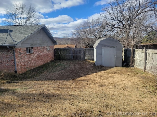 1604 S 5th St, Mcalester, OK 74501 - fenced backyard with a storage unit