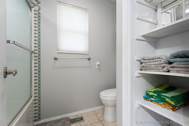 1934 Birnamwood, Miami, OK 74354 - full bath with tile patterned flooring and bath / shower combo with glass door