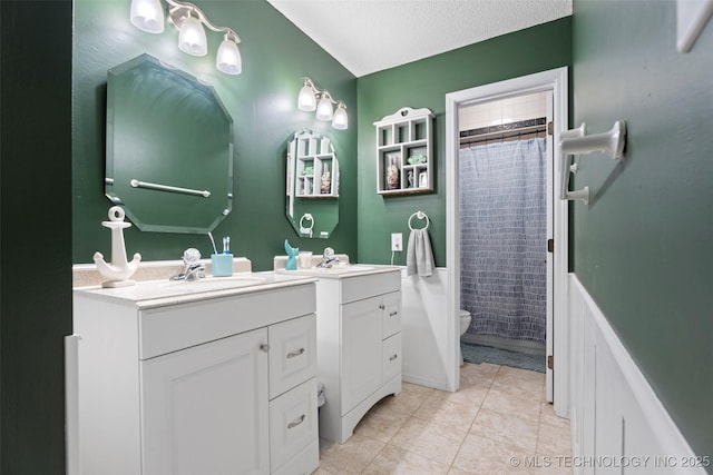 1934 Birnamwood, Miami, OK 74354 - full bath with vanity, curtained shower, and tile patterned flooring