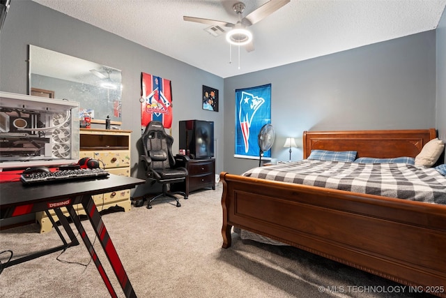 1934 Birnamwood, Miami, OK 74354 - carpeted bedroom featuring a ceiling fan and a textured ceiling