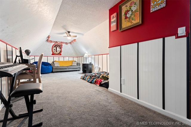 1934 Birnamwood, Miami, OK 74354 - interior space with ceiling fan, vaulted ceiling, carpet, and a textured ceiling