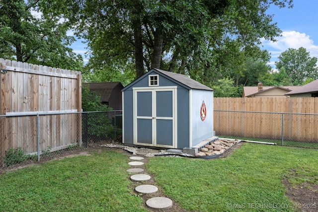 1934 Birnamwood, Miami, OK 74354 - view of shed featuring a fenced backyard