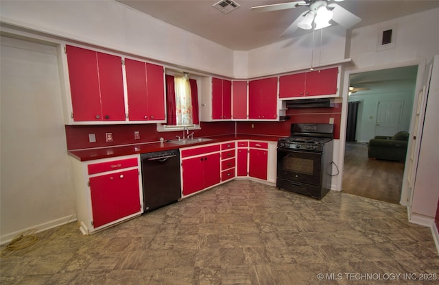 711 S 29th St W, Muskogee, OK 74401 - kitchen featuring red cabinets, black appliances, and a ceiling fan