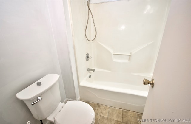711 S 29th St W, Muskogee, OK 74401 - full bathroom featuring bathtub / shower combination and stone finish flooring