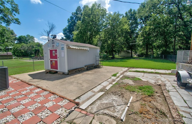 711 S 29th St W, Muskogee, OK 74401 - fenced backyard with a patio and an outdoor structure