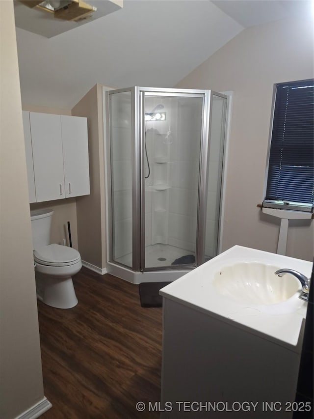 617 N 11th St, Pawnee, OK 74058 - full bathroom with lofted ceiling, a stall shower, wood finished floors, and vanity