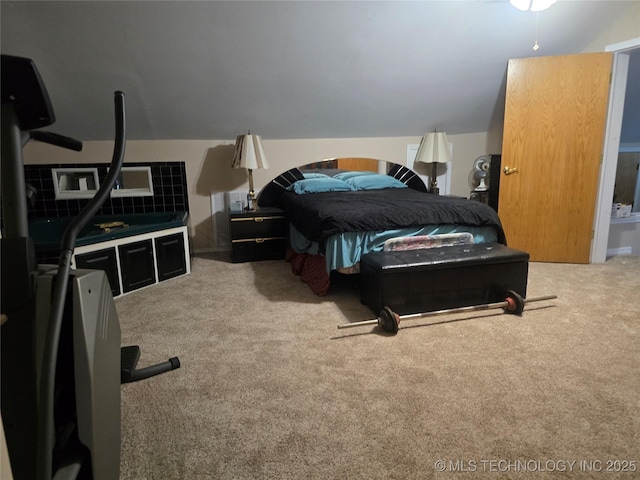 617 N 11th St, Pawnee, OK 74058 - carpeted bedroom featuring vaulted ceiling