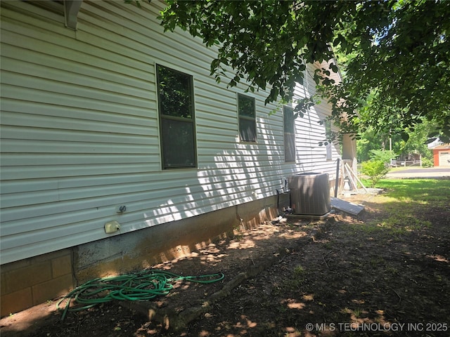 617 N 11th St, Pawnee, OK 74058 - view of property exterior featuring a central air condition unit