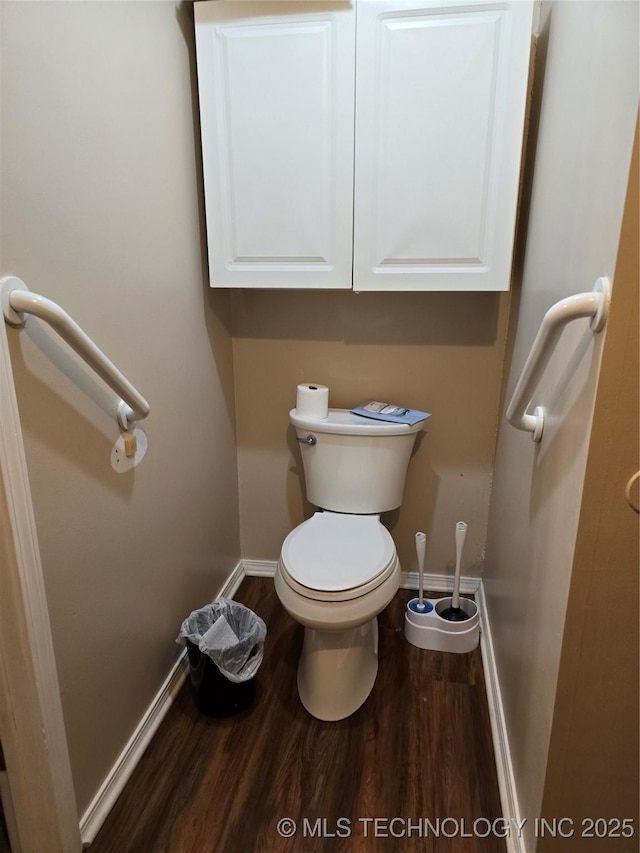 617 N 11th St, Pawnee, OK 74058 - bathroom with baseboards and wood finished floors