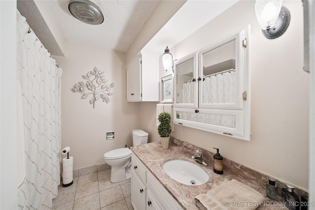 7058 E 52nd Pl, Tulsa, OK 74145 - bathroom featuring vanity, a textured ceiling, tile patterned floors, and curtained shower