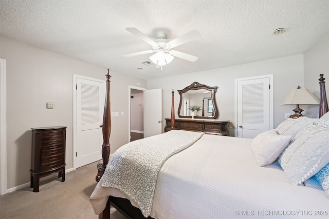 7058 E 52nd Pl, Tulsa, OK 74145 - bedroom with light colored carpet, a closet, ceiling fan, and a textured ceiling