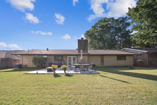 7058 E 52nd Pl, Tulsa, OK 74145 - rear view of property with french doors, brick siding, a patio, and a chimney