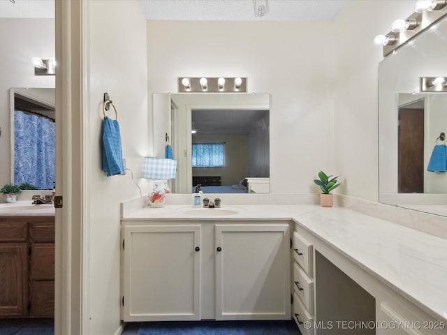 1267 Guinn Ln, Bartlesville, OK 74006 - full bathroom featuring vanity and ensuite bathroom