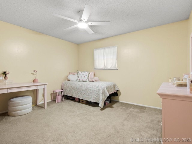 1267 Guinn Ln, Bartlesville, OK 74006 - bedroom featuring carpet, ceiling fan, and a textured ceiling