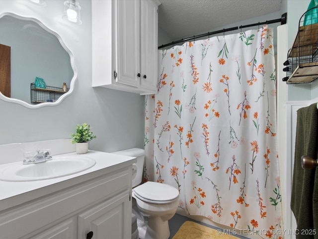 1267 Guinn Ln, Bartlesville, OK 74006 - bathroom featuring vanity, a textured ceiling, and a shower with shower curtain