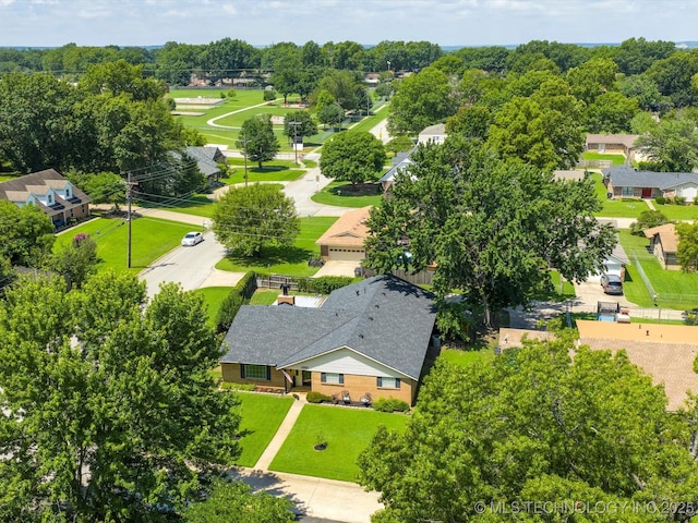 1267 Guinn Ln, Bartlesville, OK 74006 - aerial view of a tree filled landscape