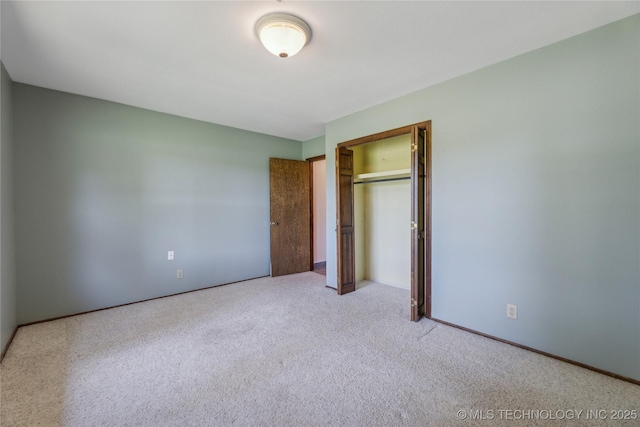 3609 E Scenic Dr, Cushing, OK 74023 - unfurnished bedroom with carpet flooring and a closet