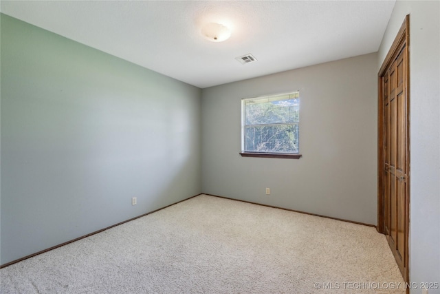 3609 E Scenic Dr, Cushing, OK 74023 - unfurnished bedroom with light carpet and a closet