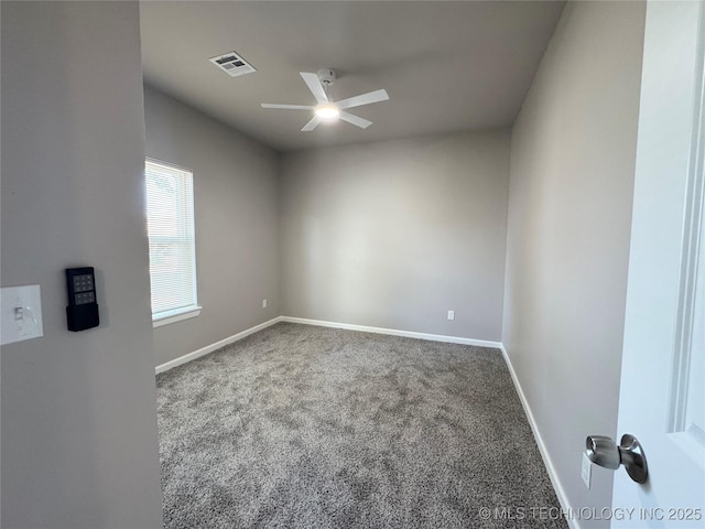 911 E Maple St, Cushing, OK 74023 - carpeted empty room with ceiling fan and baseboards