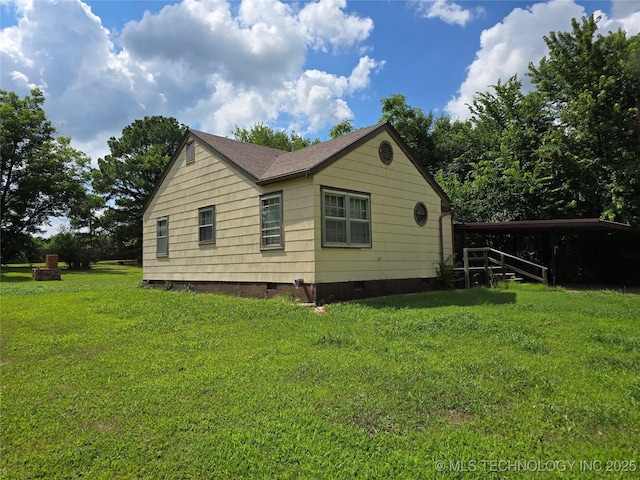 615 11th St, Pawnee, OK 74058 - view of home's exterior with crawl space and a lawn