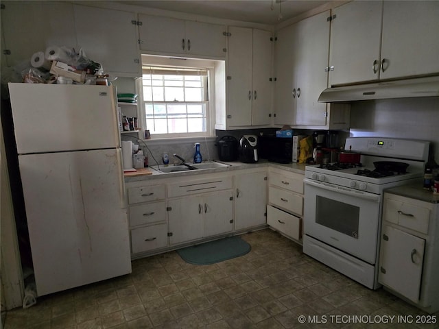 615 11th St, Pawnee, OK 74058 - kitchen featuring white appliances, under cabinet range hood, and white cabinets
