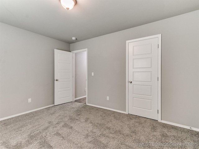 3604 E Quebec St, Broken Arrow, OK 74014 - carpeted spare room with baseboards and a smoke detector